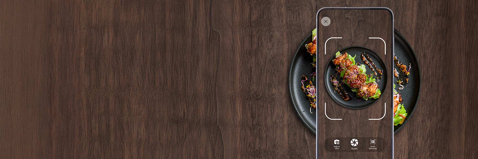A phone scanning a plate of food in the Portions Master app